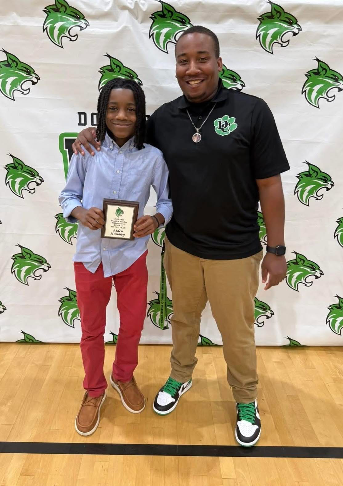 Aiden Hundley holding his DCMS Rookie of the Year plaque